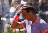 Rafa Nadal looked dismayed after his tough loss at the Italian Open to Polish star Hubert Hurkacz. (AP PHOTO)