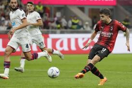 Christian Pulisic scores AC Milan's second goal in a 5-1 win over Cagliari. (AP PHOTO)